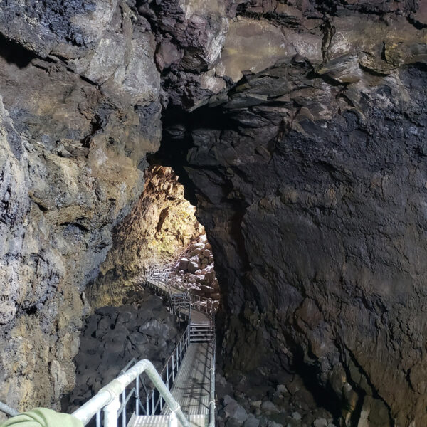 Interior of a cave with a walking platform going through it